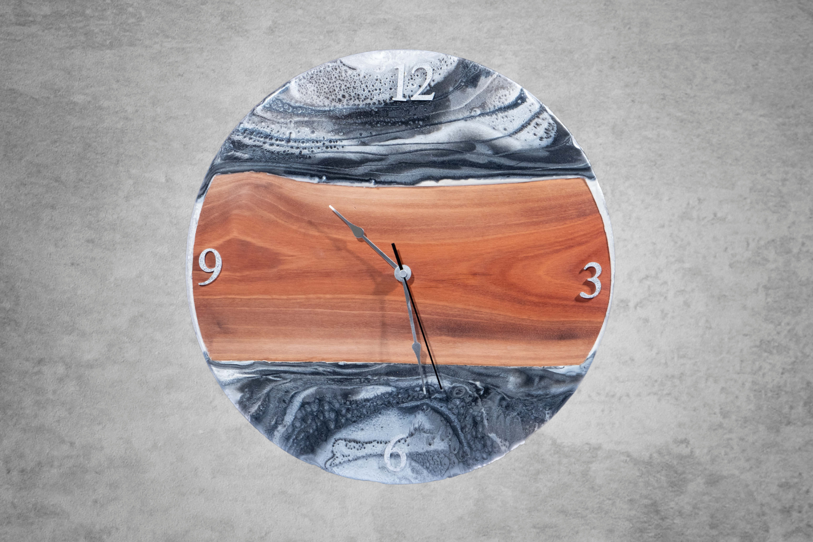 Kiaat wood slab and resin river look wall clock with silent swiss Rolex smooth mechanism.